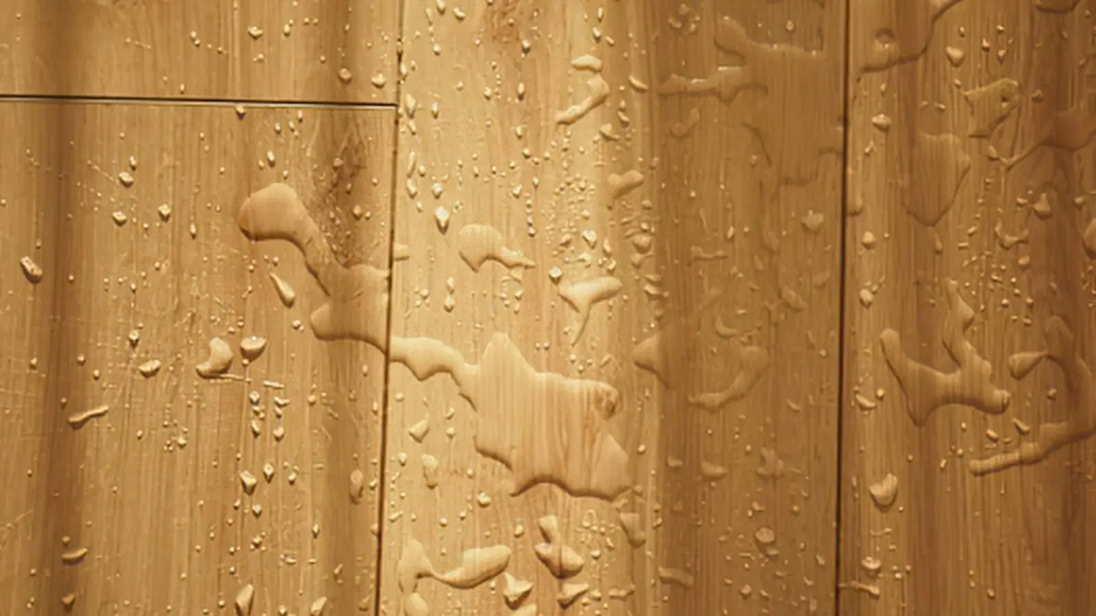 Water beads on wood flooring